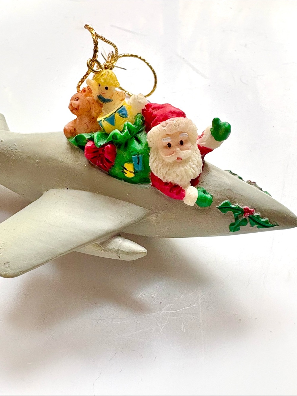 Vintage 1996 Santa Claus in an airplane Christmas ornament